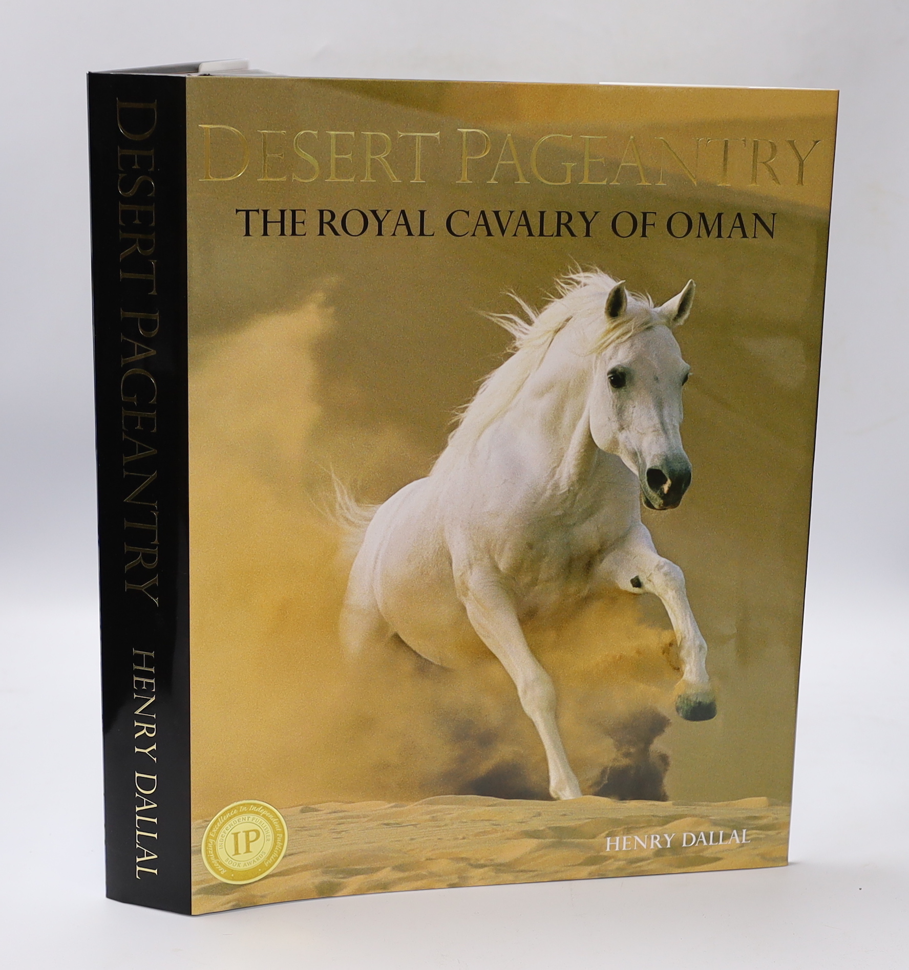 Dallal, Henry - Desert Pageantry: The Royal Cavalry of Oman, signed, folio, black pictorial boards gilt, in d/j, with original box, 2012, Note: Gold medal winner for the most outstanding design of the year, at the Indepe